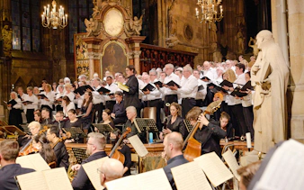 Choir and orchestra performing inside St. Stephen's Cathedral, Vienna.