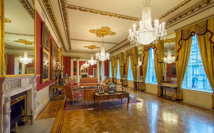 Elegant interior of a historic room with chandeliers and ornate decor in Dublin, Ireland.
