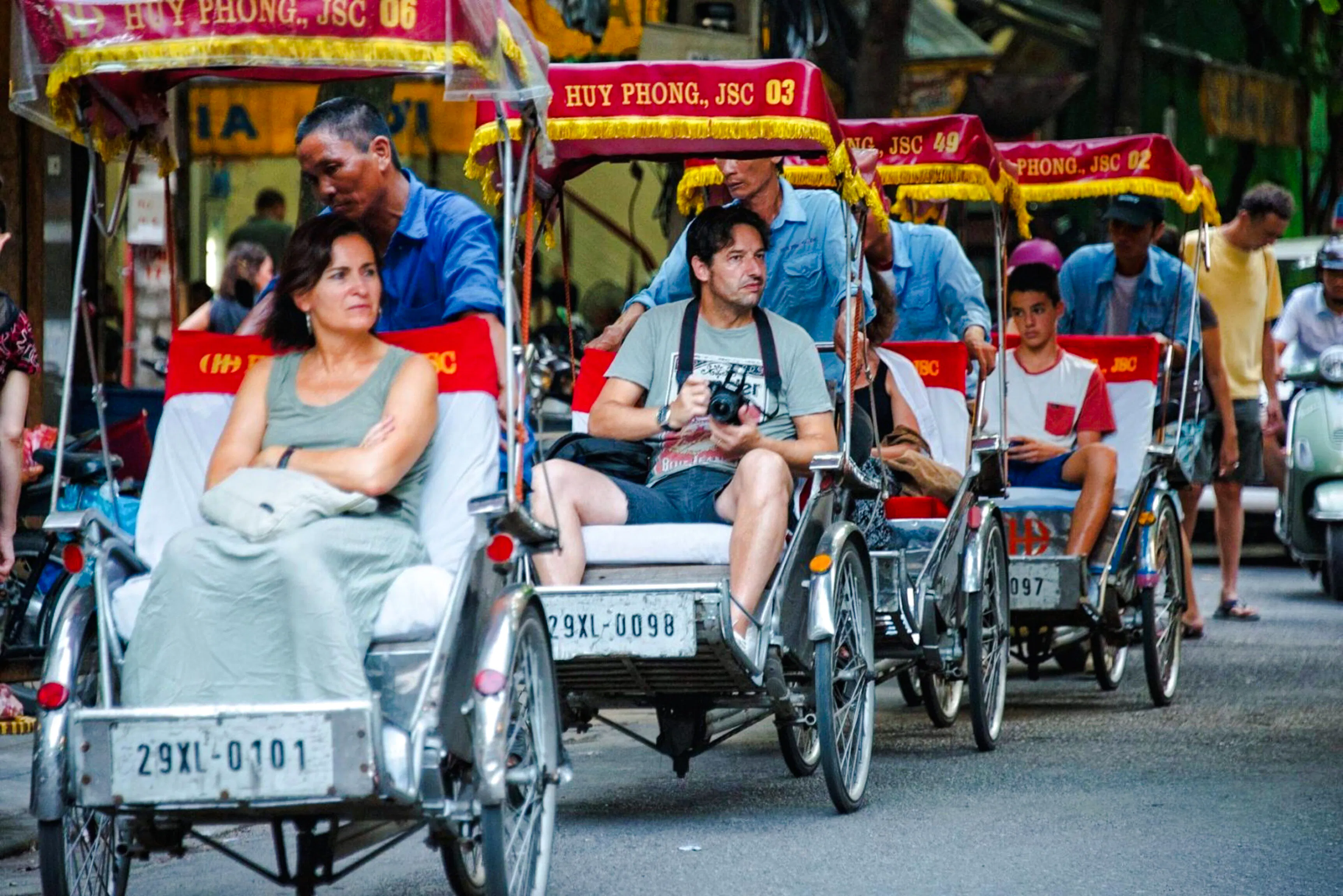 Cyclo ride through Hanoi streets, part of Temple of Literature and Ho Chi Minh Complex tour.