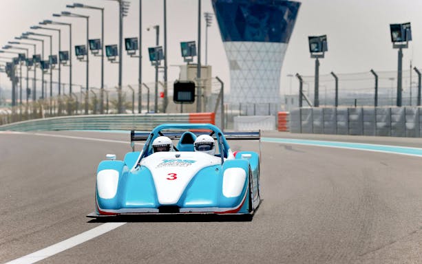 Race car on track at Yas Marina Circuit during YAS Radical SST Passenger experience.