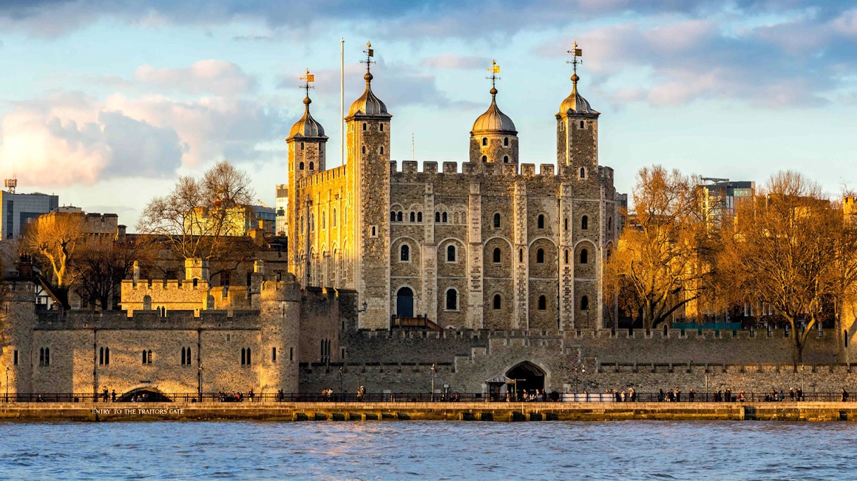 Tower of London with river view at sunset, England, UK.