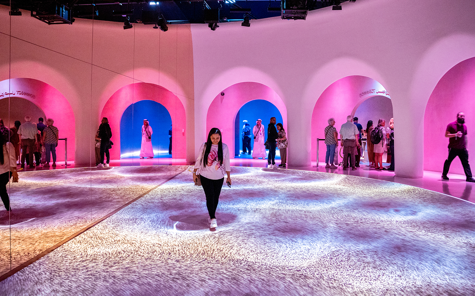 Visitors exploring exhibits on the Al Waha floor at the Museum of the Future, Dubai.
