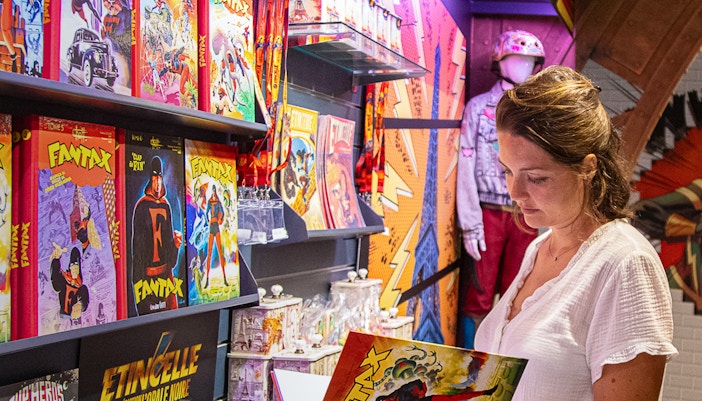 Visitor browsing comic books