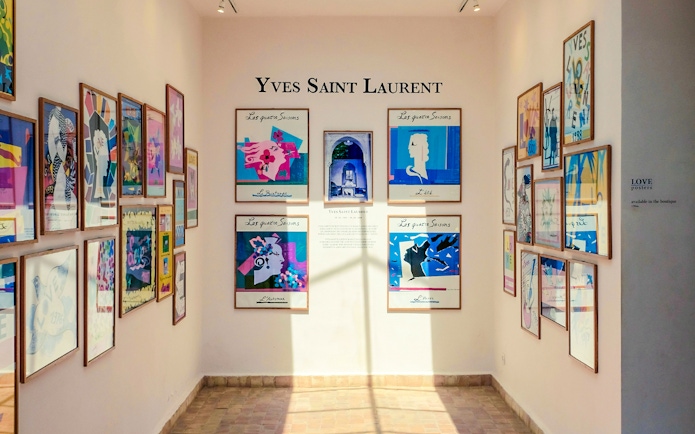Yves Saint Laurent art gallery with colorful framed posters at Marrakesh Museum.