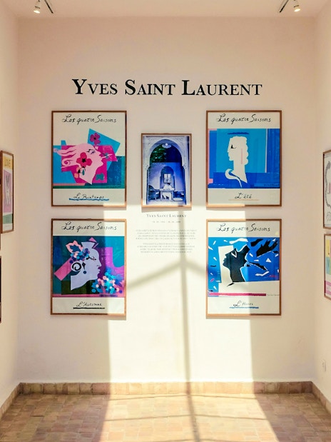 Yves Saint Laurent art gallery with colorful framed posters at Marrakesh Museum.