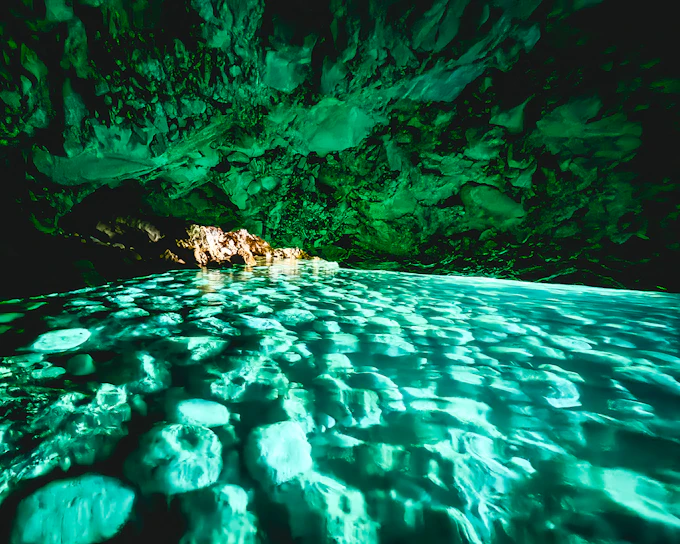 From Vlore: Blue Gem Cave, Haxhi Ali Cave & Grama Bay Speedboat Tour