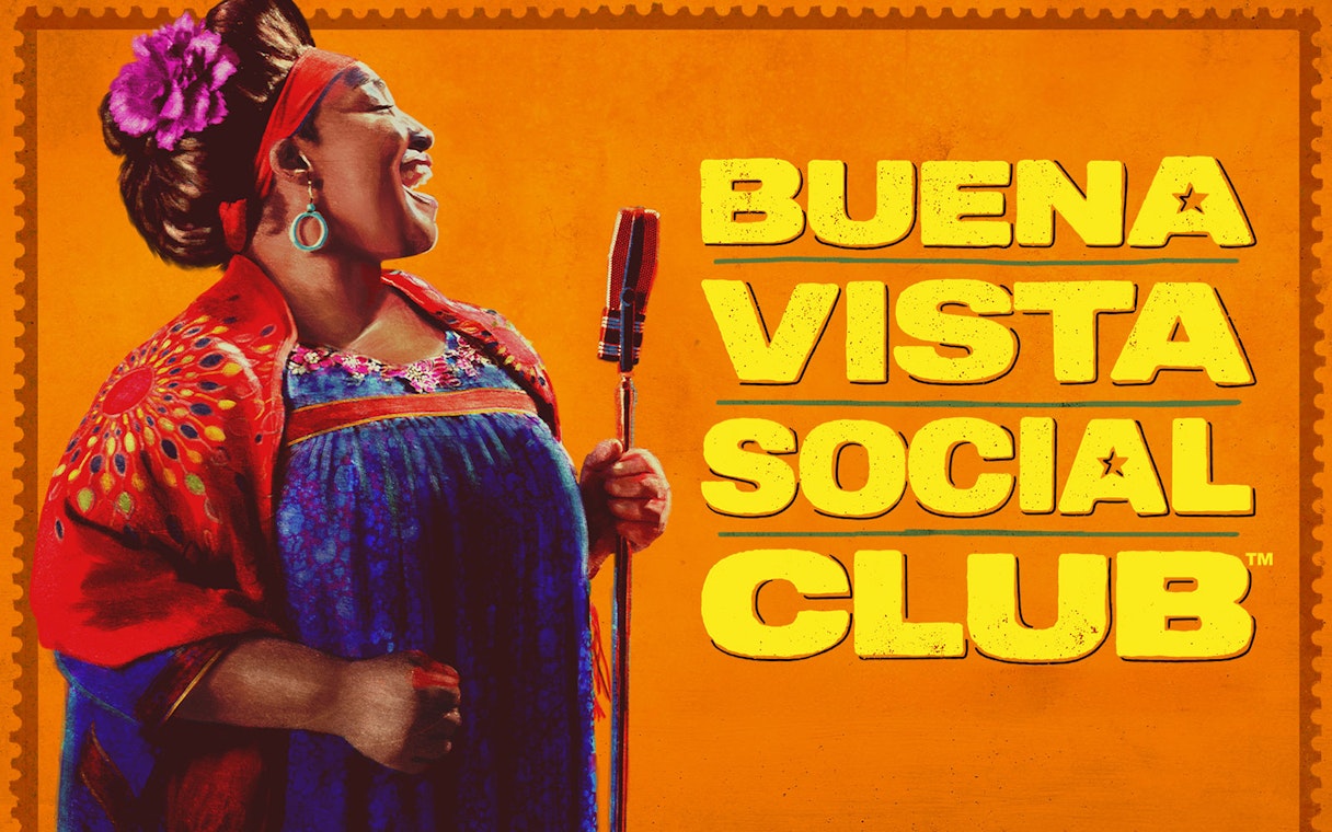 Singer performing with a microphone, Buena Vista Social Club text.