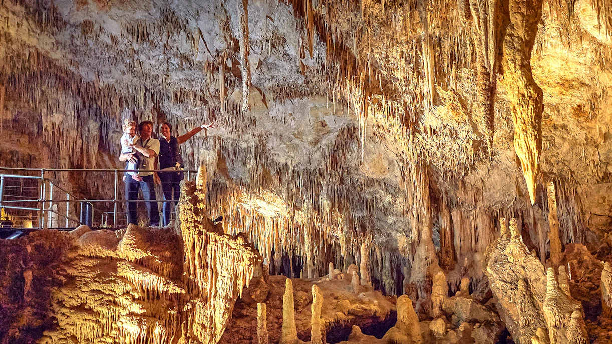Visitors exploring stalactites and stalagmites in Mammoth Cave, Margaret River.