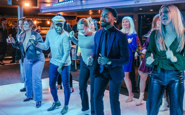 Guests dancing on a Chicago dinner cruise.