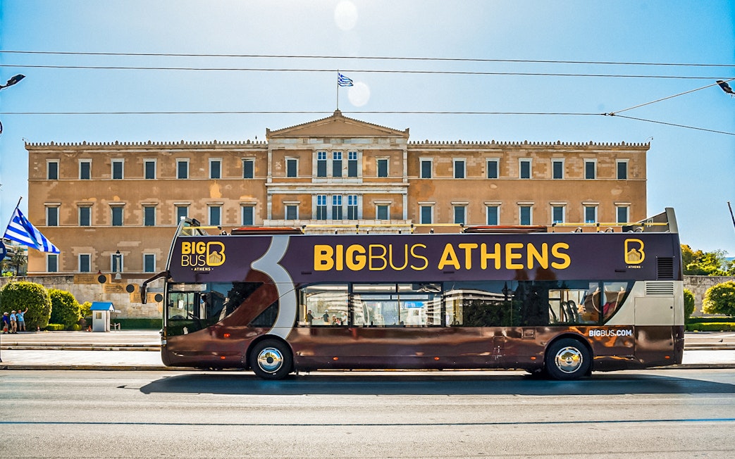 HOHO tour bus in front of the Parliament of Greece, Athens.