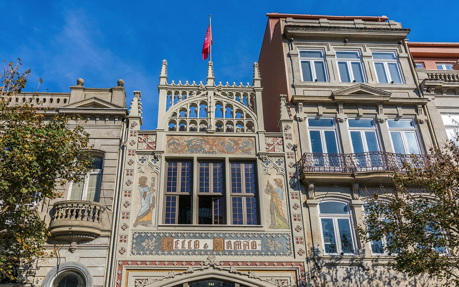 Lello Library interior with ornate wooden staircase, Porto, Portugal.