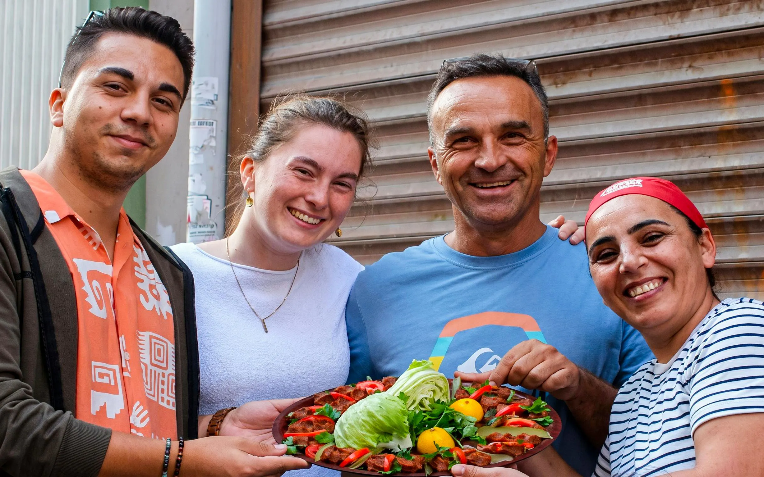 Group enjoying traditional Turkish dish on Istanbul food tour.