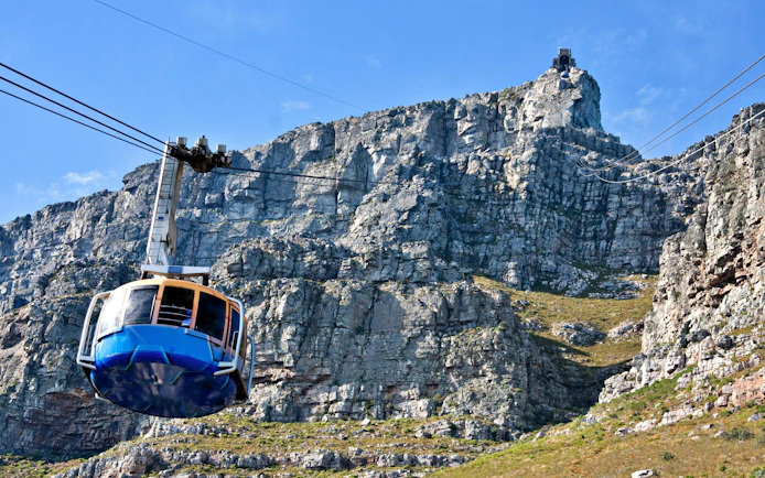 Cable car ascending Table Mountain in Cape Town, South Africa.
