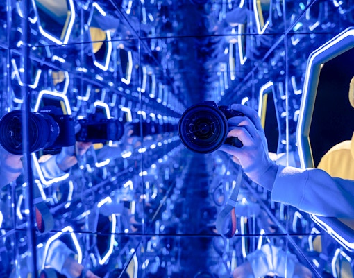 Visitors exploring interactive exhibits at the World Of Illusions in Los Angeles.