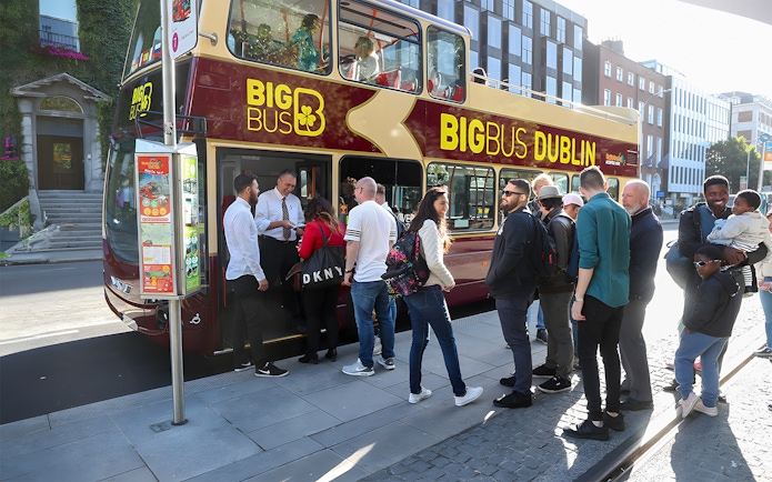 People boarding Big Bus hop-on hop-off tour in Dublin.