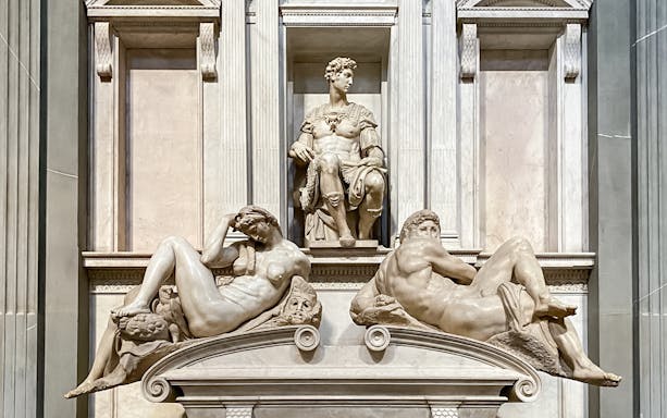 Tomb of Giuliano de Medici with sculptures Night and Day in Florence, Italy.