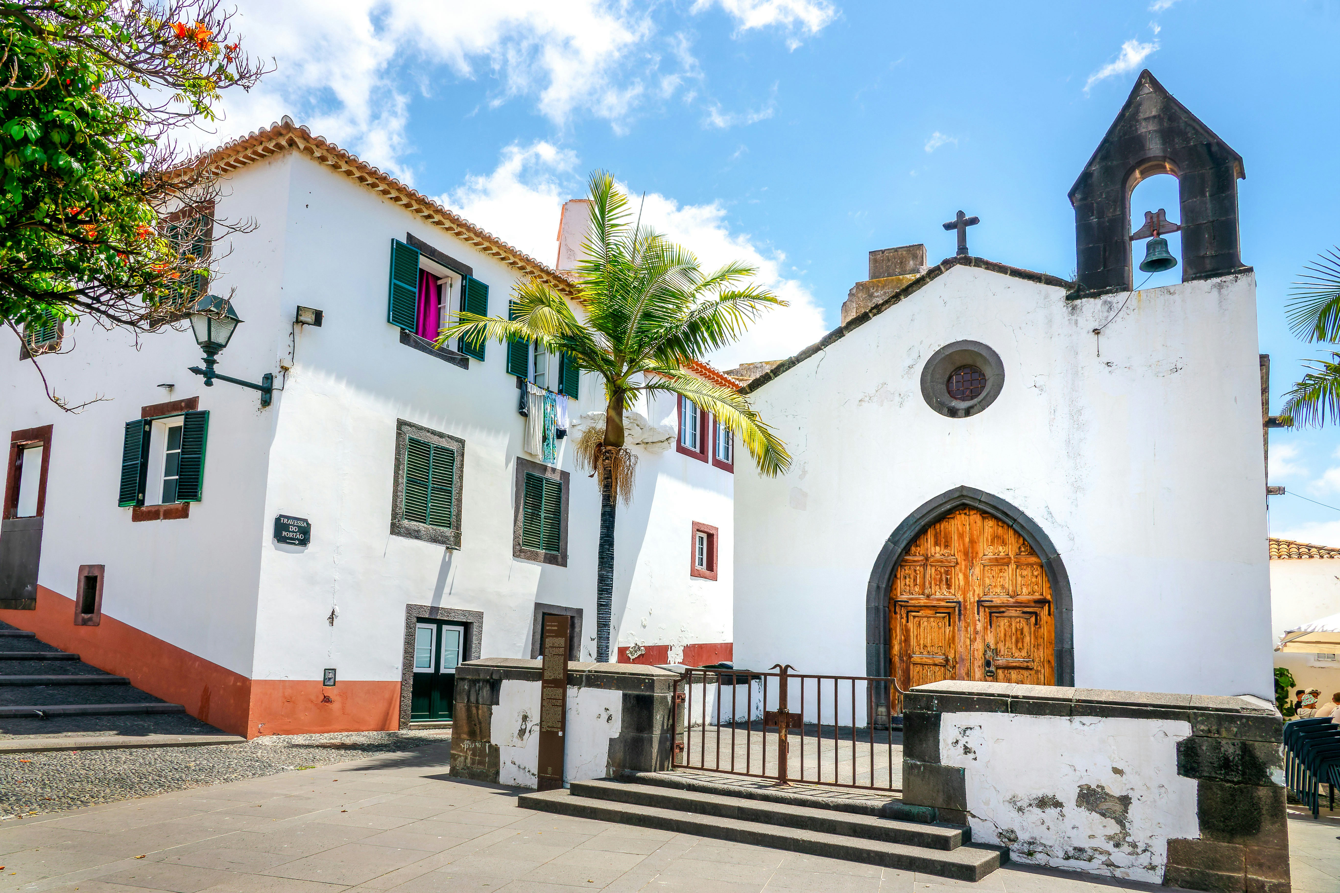 Picturesque chapel (capela do Porto Santo) in a street of the old town of Funchal, Madeira island