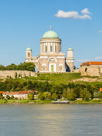 Esztergom Basilica with green dome overlooking the Danube River in Hungary.