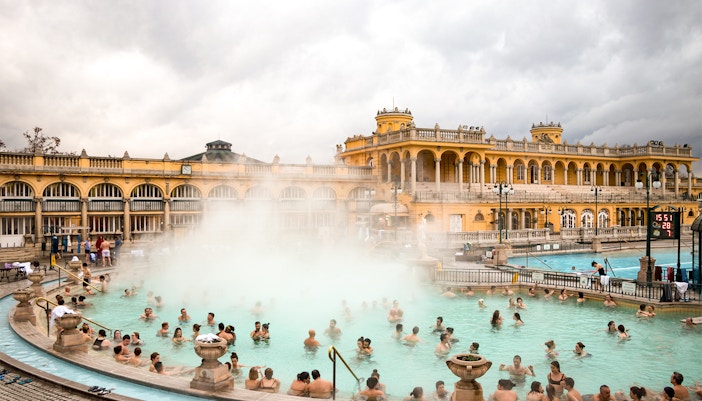 people bathing at szechenyi baths in winter