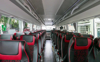 Interior of a tour bus for the Stonehenge and Bath day trip from London.