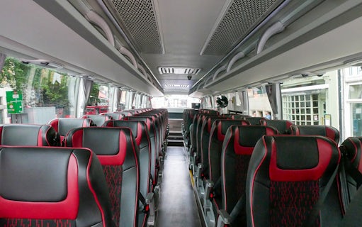 Interior of a tour bus for the Stonehenge and Bath day trip from London.