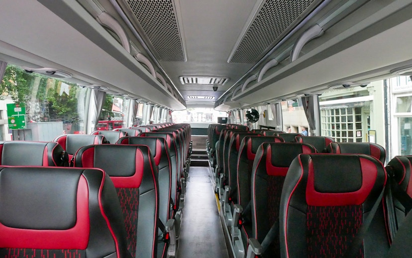 Interior of a tour bus for the Stonehenge and Bath day trip from London.