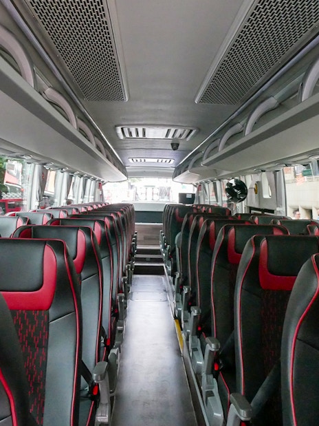 Interior of a tour bus for the Stonehenge and Bath day trip from London.