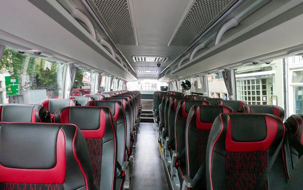 Interior of a tour bus for the Stonehenge and Bath day trip from London.
