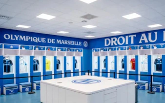 Olympique de Marseille locker room at CEPAC Vélodrome during guided tour.