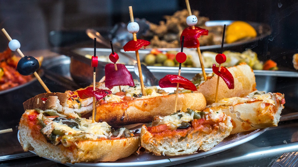 Tapas with skewers in Granada, Andalusia, Spain.