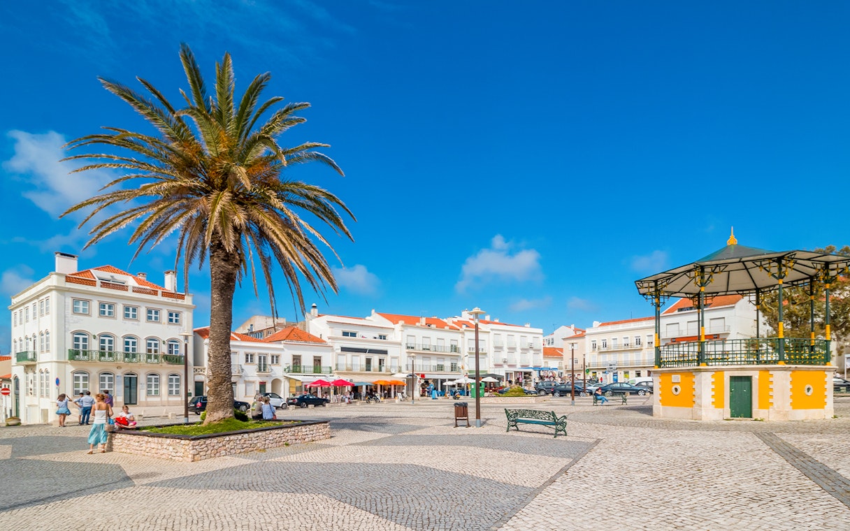 Central square of Nazaré with pavilion and Nossa Senhora da Nazaré Church, Portugal.