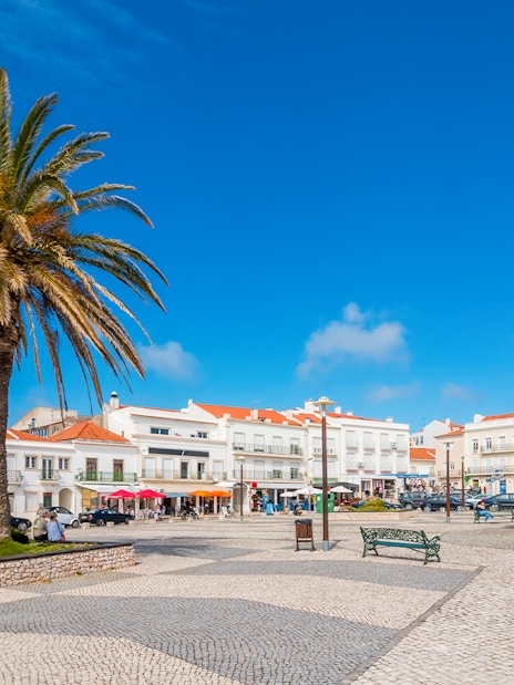Central square of Nazaré with pavilion and Nossa Senhora da Nazaré Church, Portugal.