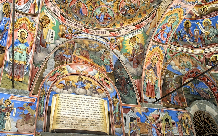 Frescoes depicting religious scenes inside Rila Monastery, Bulgaria.