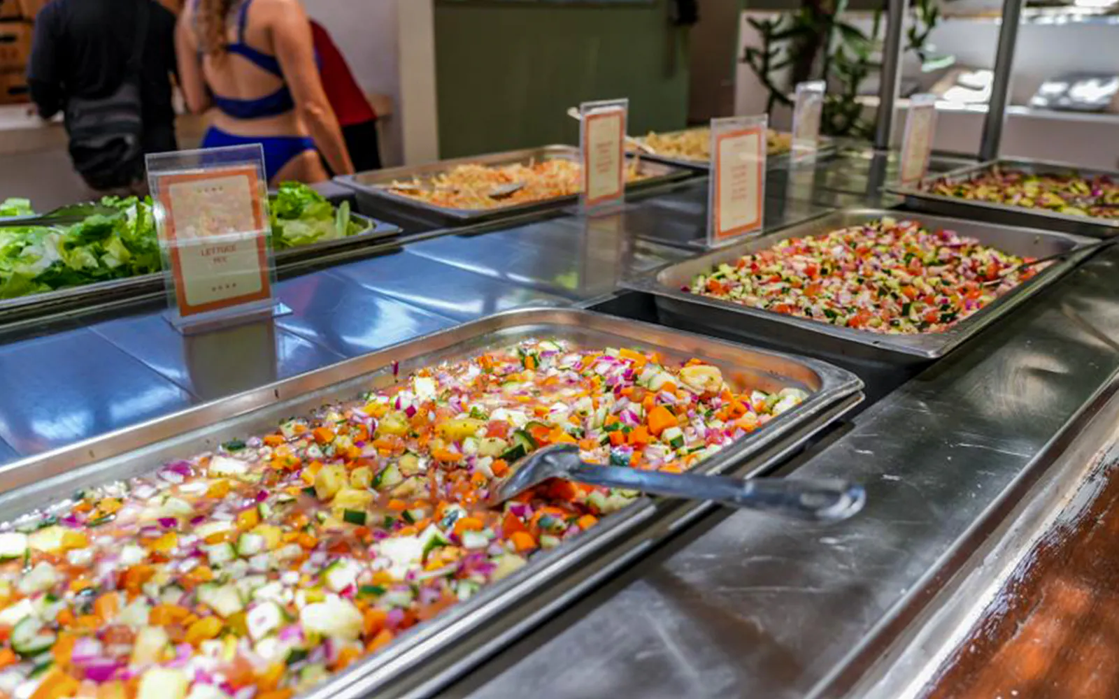 Buffet with fresh salads on All-Inclusive Catamaran to Isla Mujeres Tour.