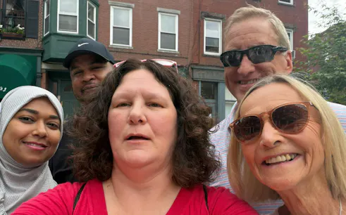 Group of people on a self-guided city exploration game in Boston.