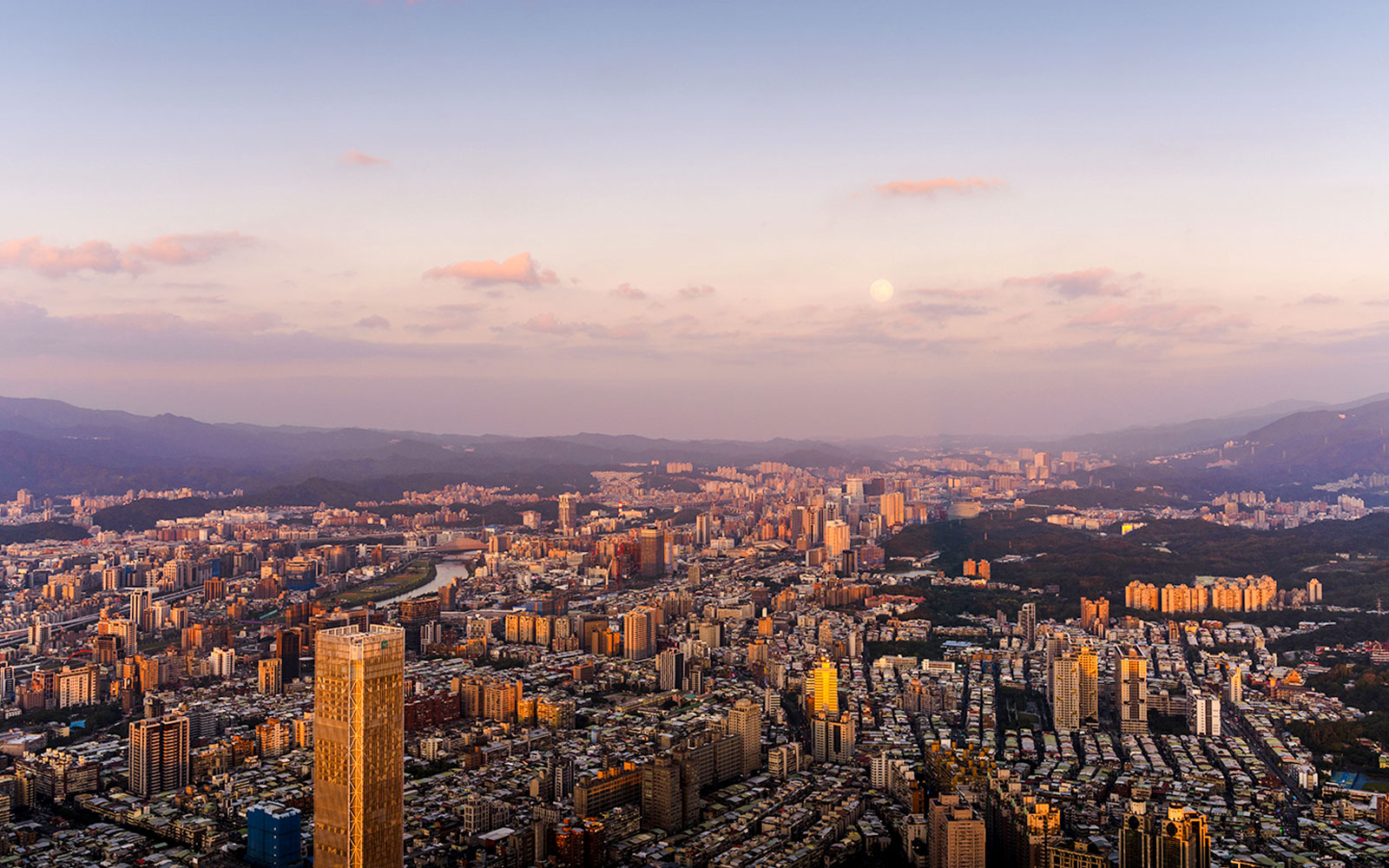 Aerial view of Taipei cityscape at sunset from Taipei 101, Taiwan.