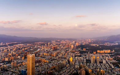 Aerial view of Taipei cityscape at sunset from Taipei 101, Taiwan.