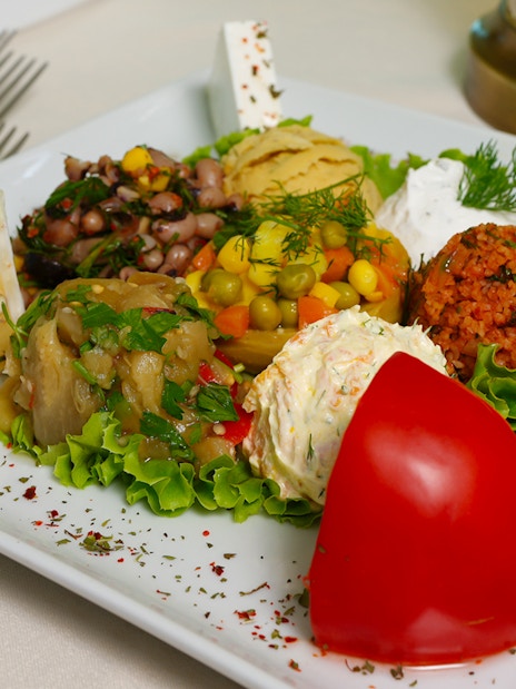 Turkish meze platter with stuffed grape leaves on Bosphorus Dinner Cruise.