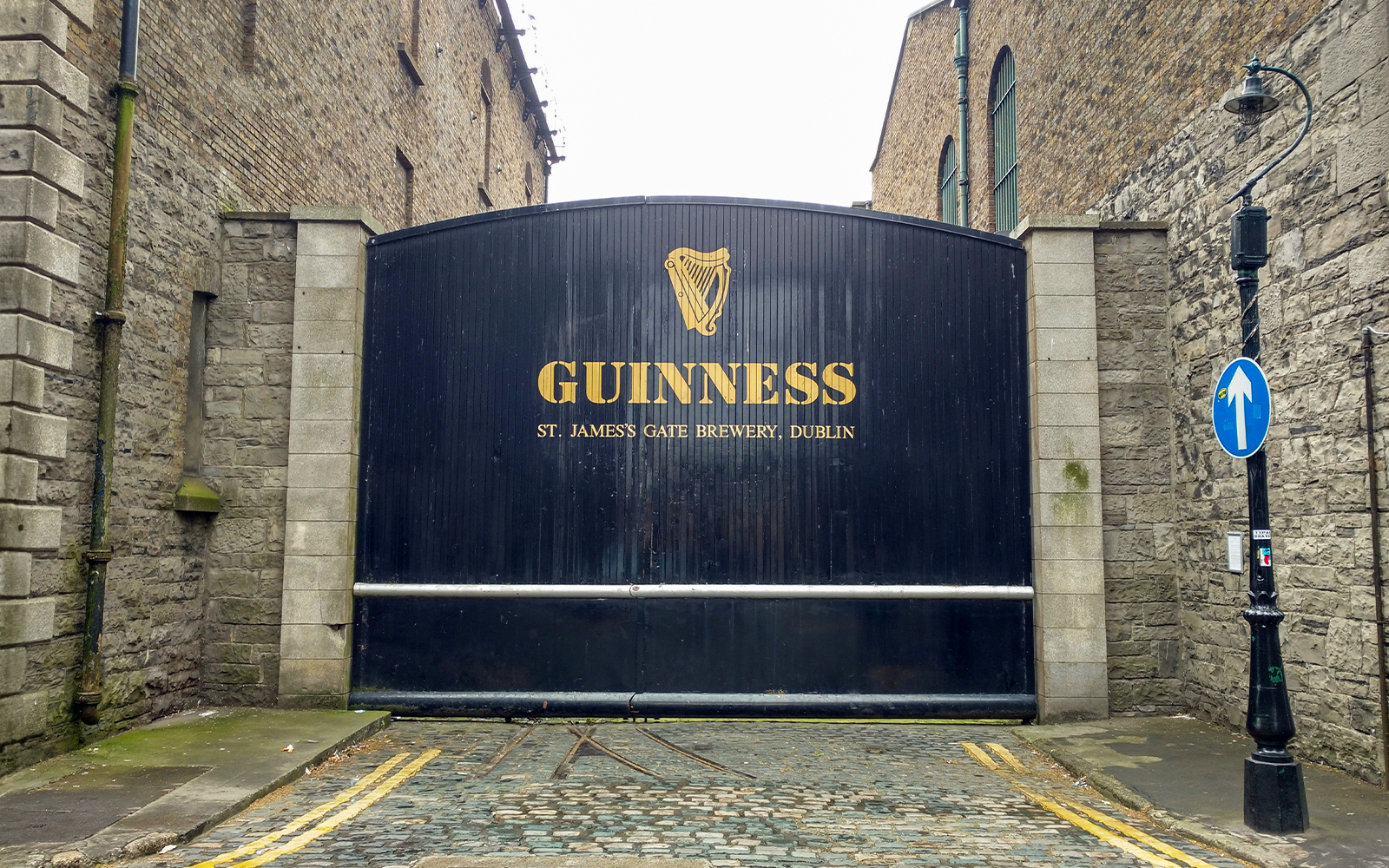 Hop-on hop-off bus in Dublin with view of Guinness Storehouse and Gravity Bar.
