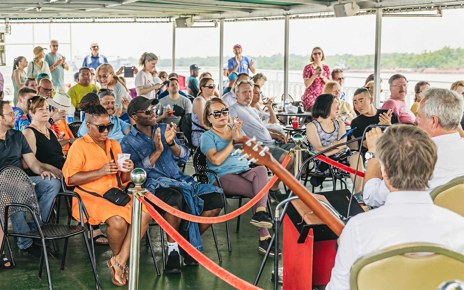 Guests enjoying live jazz music on the Riverboat City of New Orleans brunch cruise.