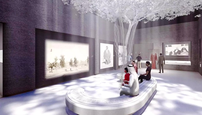 Visitors viewing exhibits at Zayed National Museum, Abu Dhabi.