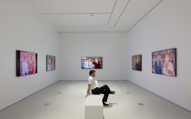 Visitor viewing Ragnar Kjartansson's Mercy Exhibition at National Gallery of Victoria.