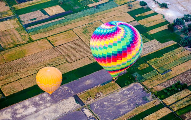 Hot air balloon over Cappadocia's unique rock formations, Turkey.