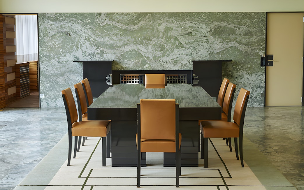 Villa Cavrois dining room with modern table and chairs, France.