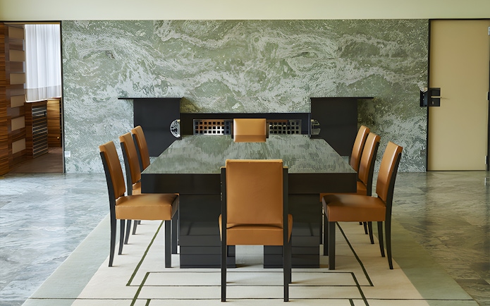 Villa Cavrois dining room with modern table and chairs, France.