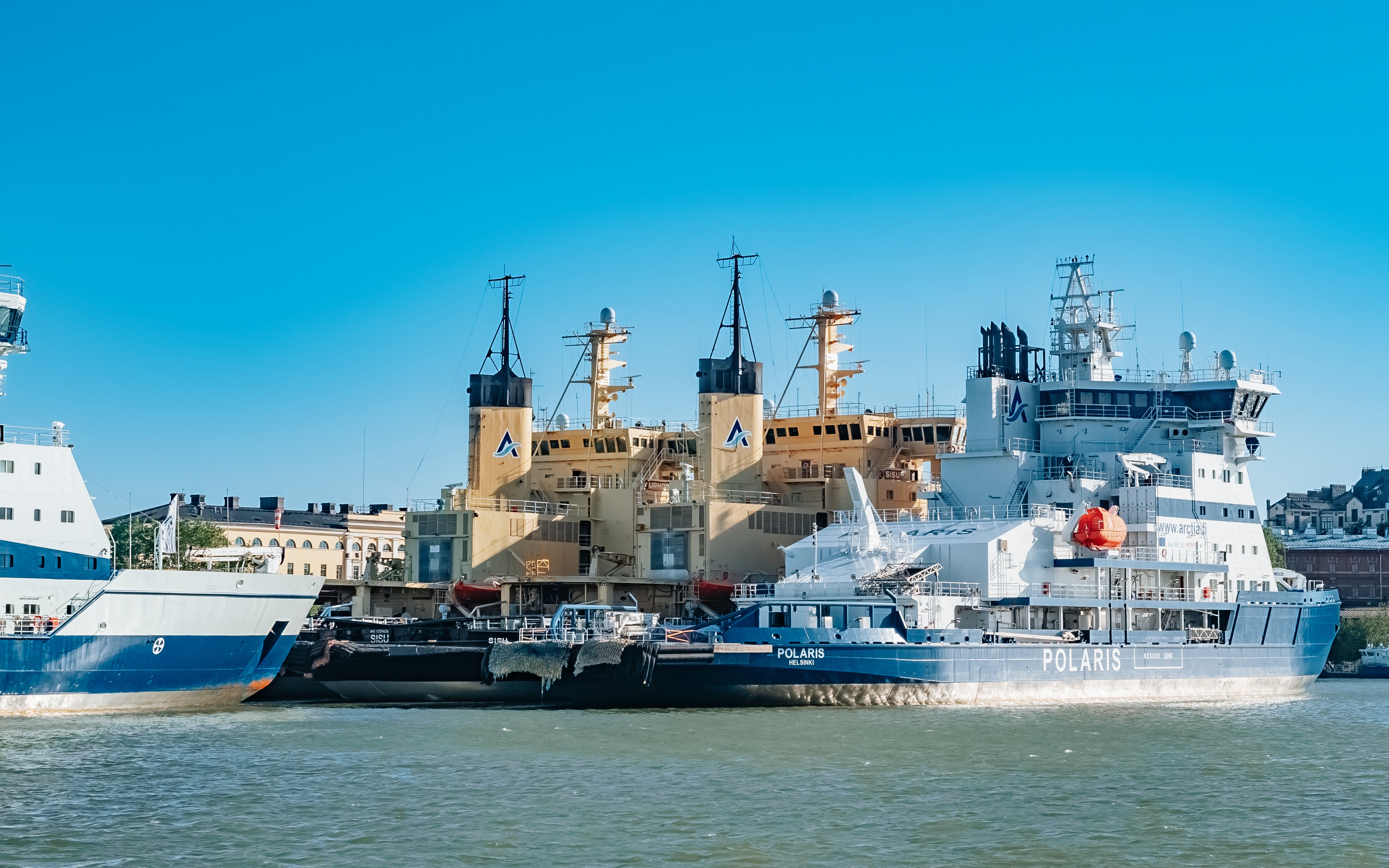 Icebreaker ships docked at Katajanokka peninsula near Market Square, Helsinki, in summer.