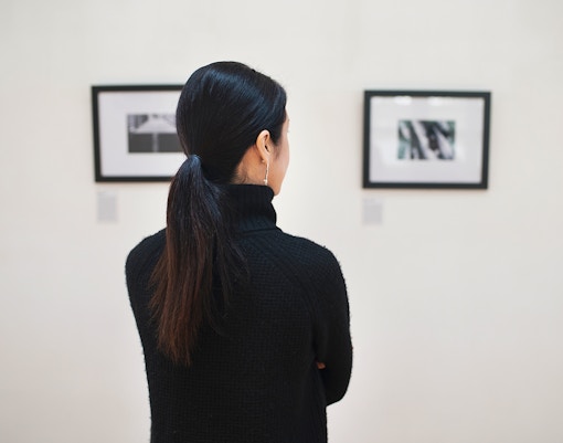 Woman looking at drawings and sketches