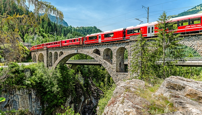 The Glacier Express from St. Moritz to Chur crosses over the Solis Viaduct.
