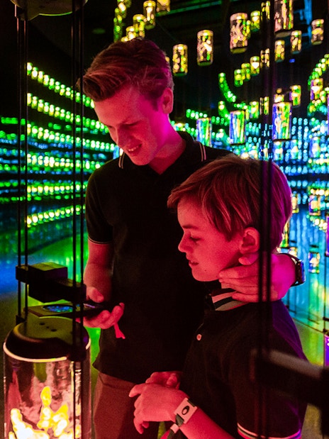 Visitors exploring interactive light display at Museum of The Future, Dubai.
