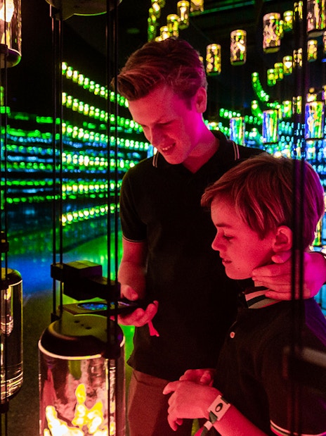 Visitors exploring interactive light display at Museum of The Future, Dubai.